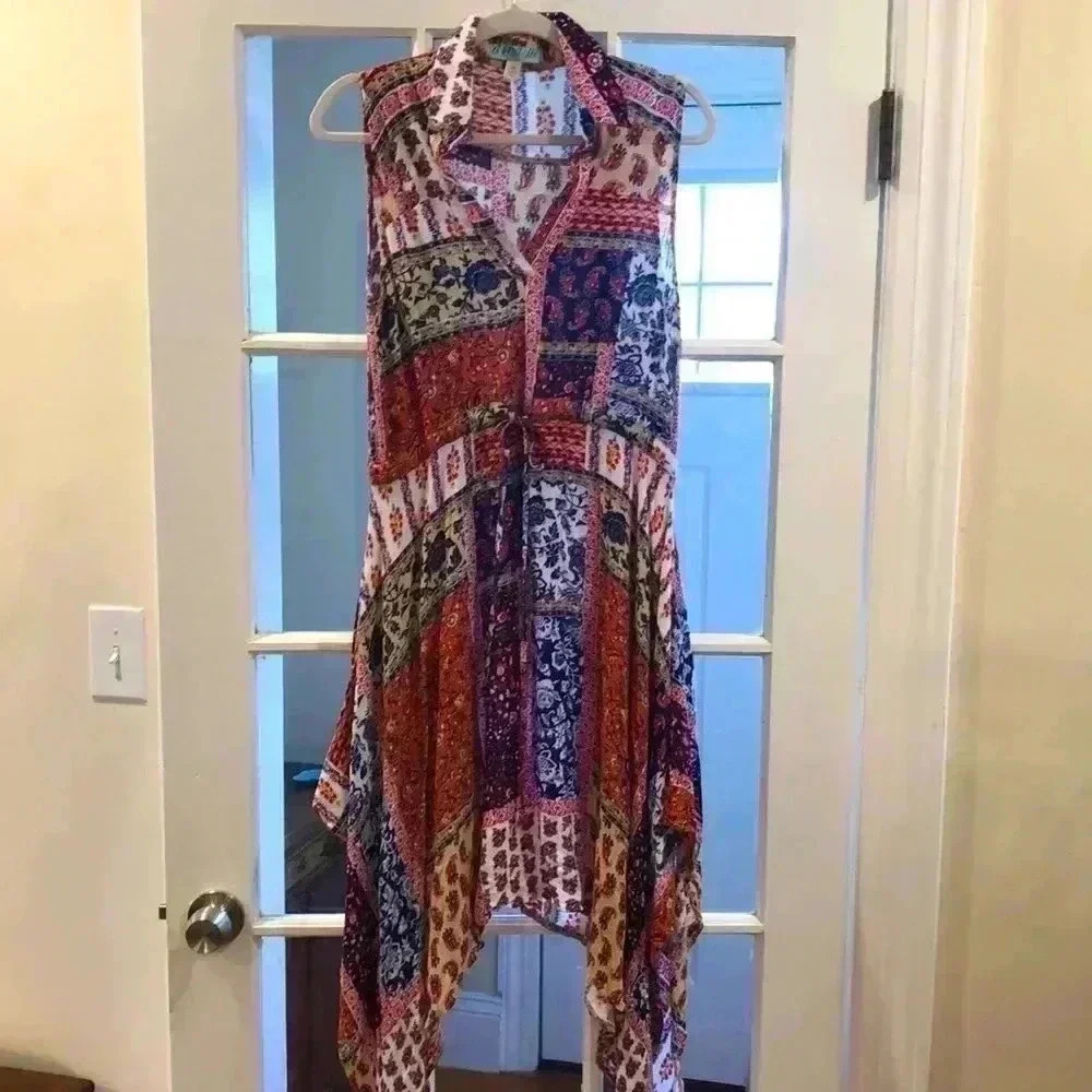 Aina Be rayon sleeveless kerchief bottom dress.